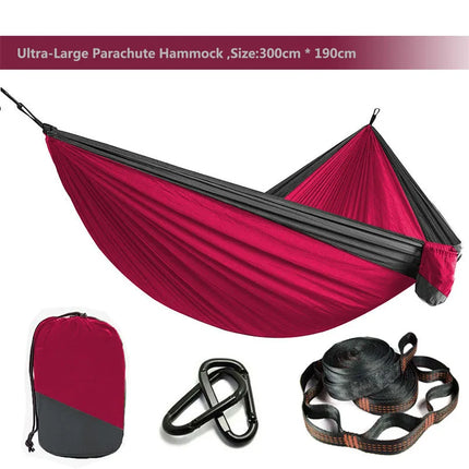 Solid color parachute hammock for two, includes hammock straps and black carabiner.